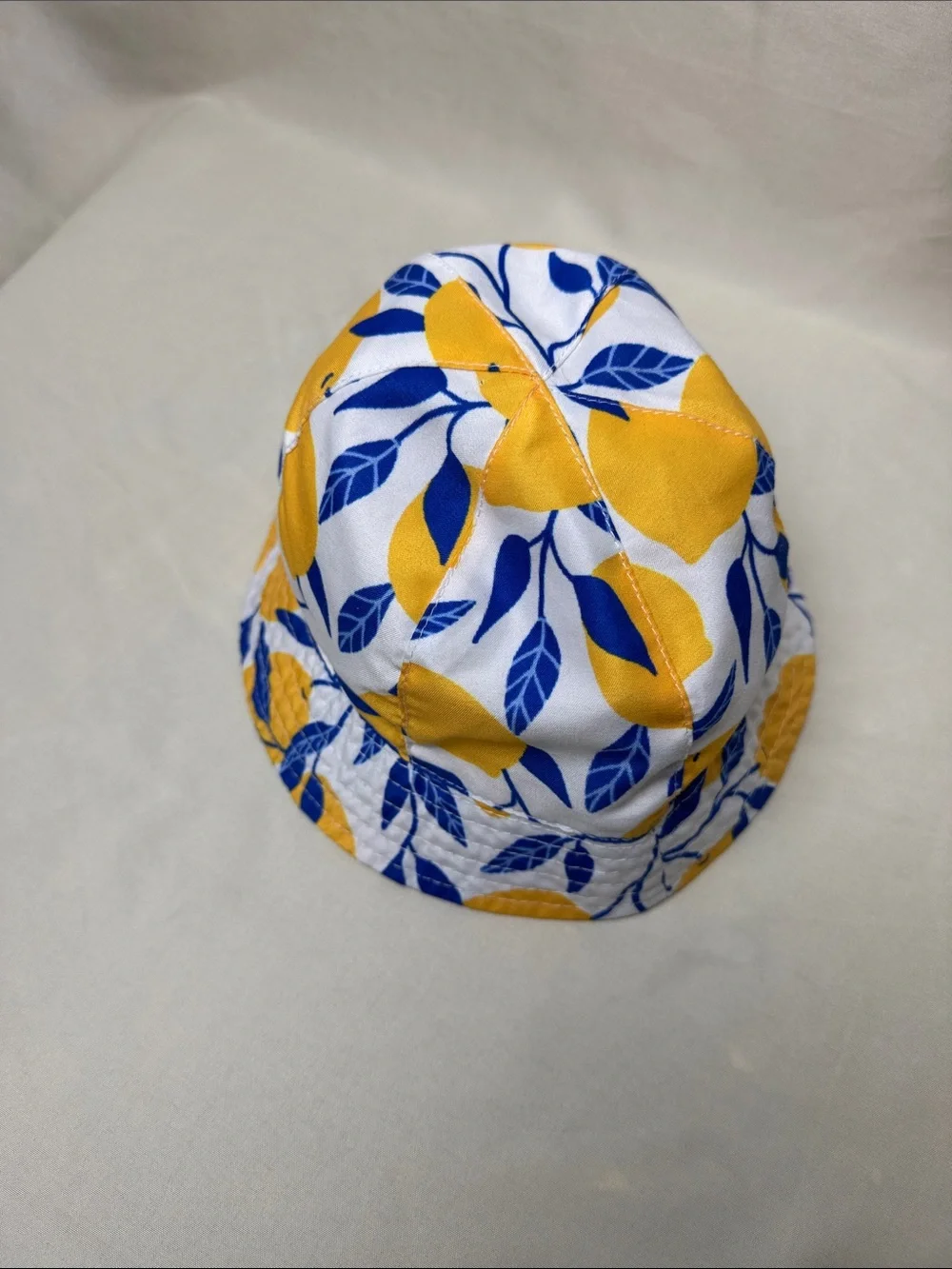 Infant’s Boutique Yellow & Blue Lemon Print Bucket Sun Hat with Chin Strap